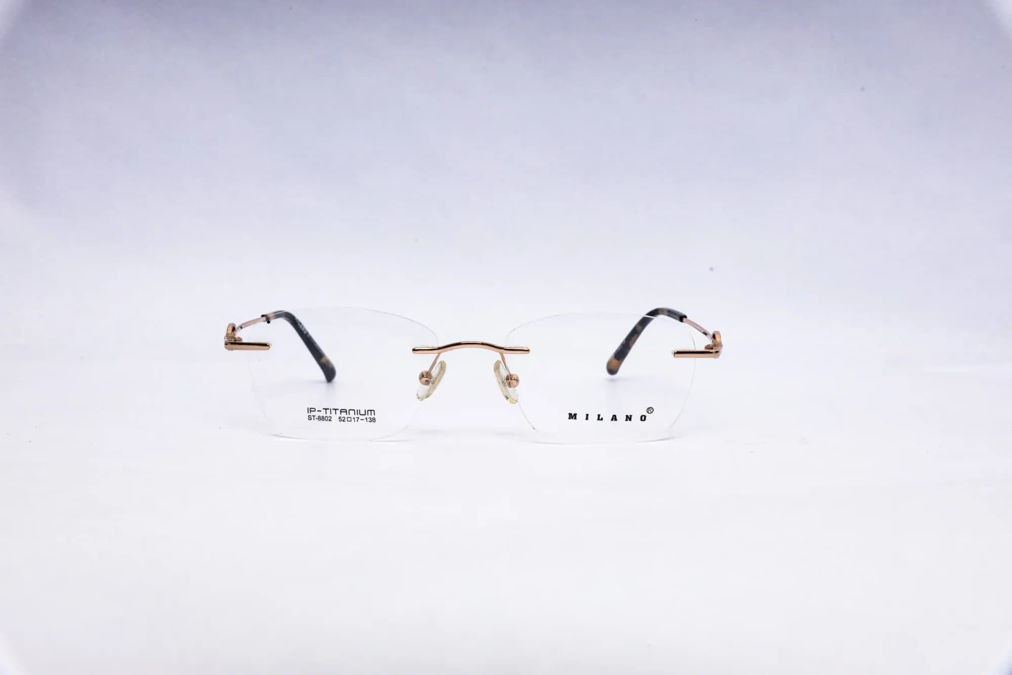 MILANO Rimless Oval Copper Gold Titanium Eyeglasses - front view