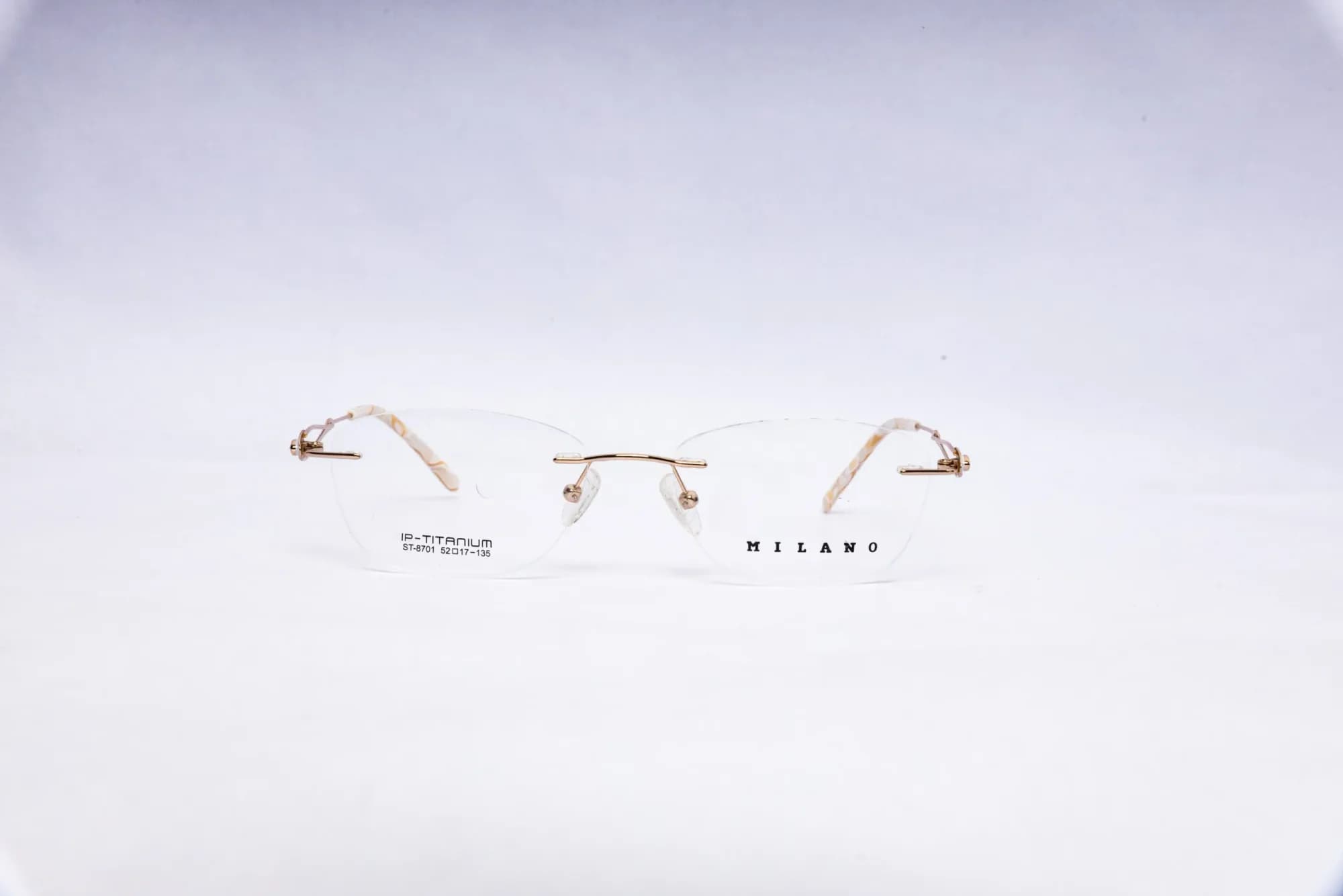 MILANO Rimless Oval Golden WhiteTitanium Eyeglasses - front view