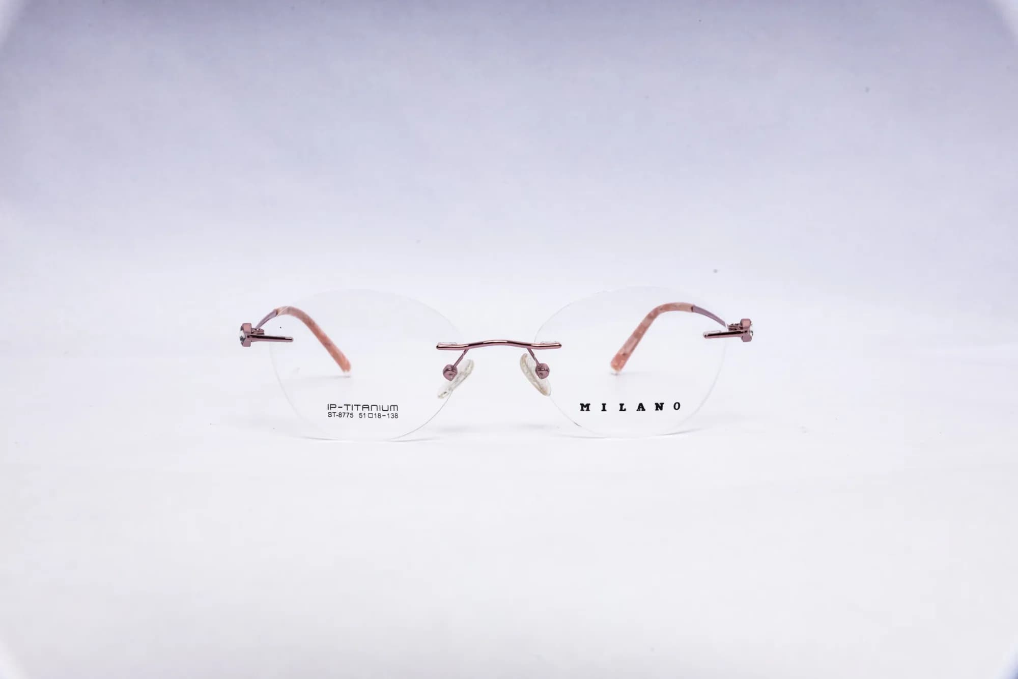 MILANO Rimless Round Golden Titanium Eyeglasses - front view