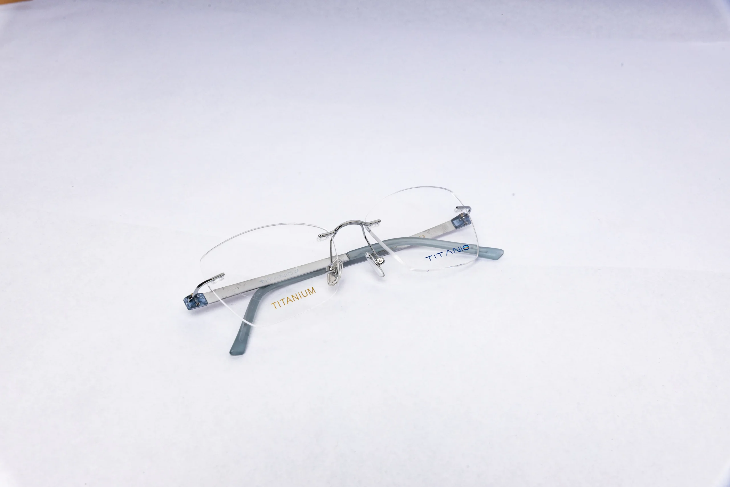TITANIUM Rimless Silver Blue Eyeglasses - Image 5
